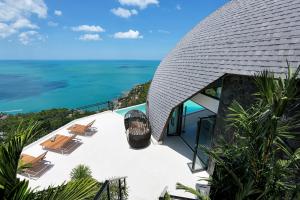 an image of a house with a view of the ocean at Villa Moonshadow - Multiple Award Winning Villa in Chaweng Noi Beach