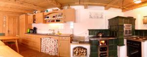 Una cocina o zona de cocina en Schermerhütten