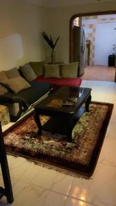 a living room with a couch and a coffee table at PINEVALLEY APT.SUITE 3A 