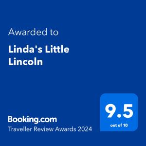 Sertifikat, nagrada, logo ili drugi dokument prikazan u objektu Linda's Little Lincoln