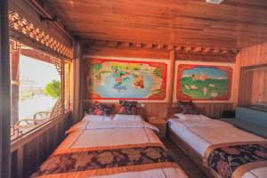TIBET Guest house 虎跳峡卓玛客栈客房内的一张或多张床位