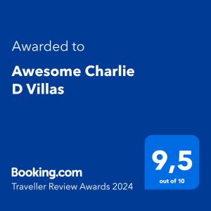 a blue sign with the text awarded to awesome charity d villas at Awesome Charlie D Villas in Anse Kerlan