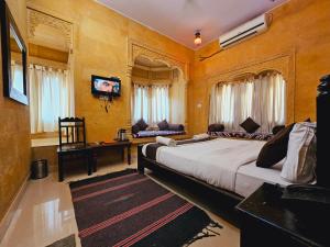 TV a/nebo společenská místnost v ubytování Hotel Royal Haveli
