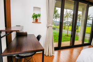 an office with a desk and a window at Hotel Circle one in Hitoyoshi