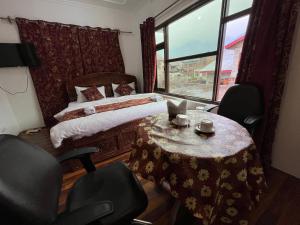 Letto o letti in una camera di The Light House