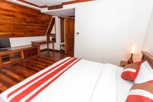 Postel nebo postele na pokoji v ubytování Cheathata CTA Hotel Siem Reap