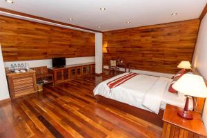 Postel nebo postele na pokoji v ubytování Cheathata CTA Hotel Siem Reap