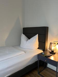 Letto o letti in una camera di Hotel Berg