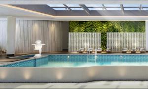 Bazén v ubytování Wyndham Foshan Nanhai nebo v jeho okolí