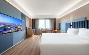 IntercityHotel Shanghai Hongqiao Airport - Free Minibar for First Night客房内的一张或多张床位