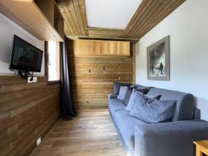 TV a/nebo společenská místnost v ubytování Résidence Sarvan - Charmant studio ski aux pieds aux Ménuires MAE-5964