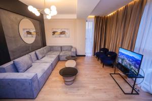 TV a/nebo společenská místnost v ubytování Arium Hotel Baku