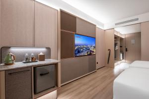 IntercityHotel Shanghai Hongqiao Airport - Free Minibar for First Night客房内的一张或多张床位