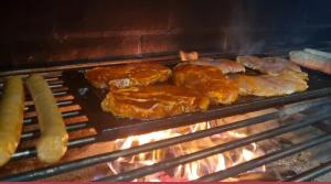 a bunch of food is cooking in an oven at B&B Penzión Magura in Bardejov