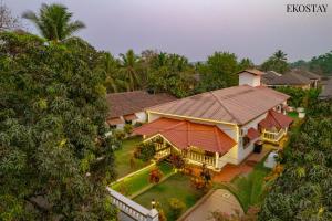 an overhead view of a house in a forest at EKOSTAY Gold - CASA PORTO Villa in Anjuna