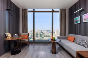 Istumisnurk majutusasutuses UrCove by Hyatt Foshan Downtown