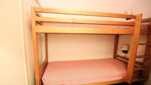 Postel nebo postele na pokoji v ubytování Résidence Parc Aux Etoiles - C101PAE - APPARTEMENT 2 CHAMBRES AVEC TERRASSE MAE-8744