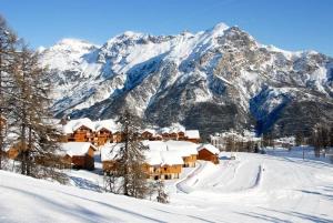 Résidence Parc Aux Etoiles - C101PAE - APPARTEMENT 2 CHAMBRES AVEC TERRASSE MAE-8744 v zimě + 3 fotografie