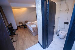 Postel nebo postele na pokoji v ubytování Arium Hotel Baku