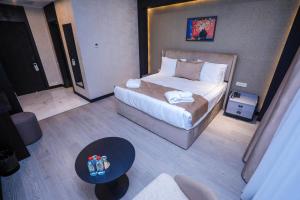 Postel nebo postele na pokoji v ubytování Arium Hotel Baku