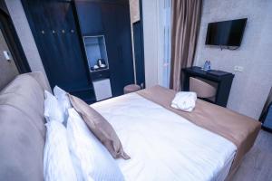 Postel nebo postele na pokoji v ubytování Arium Hotel Baku