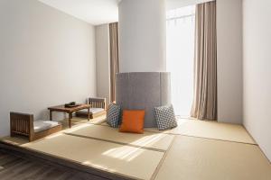 Istumisnurk majutusasutuses UrCove by Hyatt Foshan Downtown