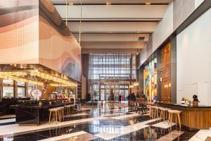 Restoran või mõni muu söögikoht majutusasutuses UrCove by Hyatt Foshan Downtown