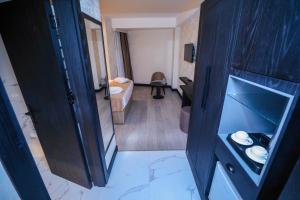 TV a/nebo společenská místnost v ubytování Arium Hotel Baku