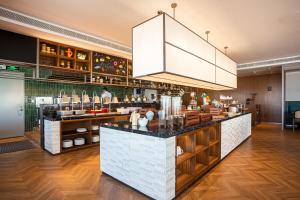 Sohvabaar või baar majutusasutuses UrCove by Hyatt Foshan Downtown