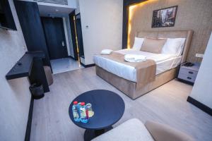 Postel nebo postele na pokoji v ubytování Arium Hotel Baku