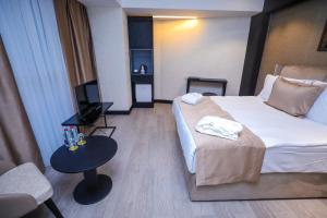 Postel nebo postele na pokoji v ubytování Arium Hotel Baku