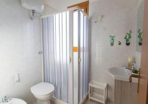 Et badeværelse på Residence Tre Palme - Localo + 35 billeder