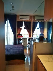 Postel nebo postele na pokoji v ubytování Studio Pleasant Tifolia