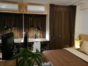 Postel nebo postele na pokoji v ubytování Studio Pleasant Tifolia