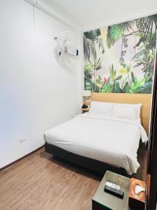 Ένα ή περισσότερα κρεβάτια σε δωμάτιο στο A25 Hotel - 197 Thanh Nhàn