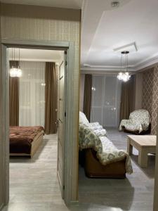 เตียงในห้องที่ Apartment in Tbilisi Eristavi