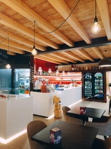 The lounge or bar area at TOURING HOTEL & SPA