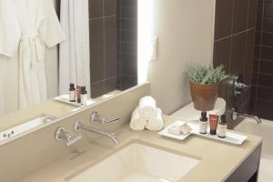 Koupelna v ubytování Hotel Lucent