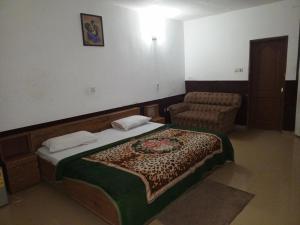 Katil atau katil-katil dalam bilik di Etna hotel