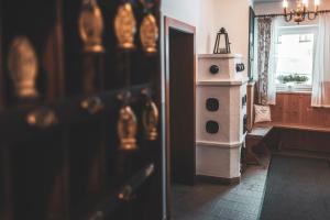 a room with a small podium in the corner of a room at Apartmenthaus Maxl in Bad Hofgastein