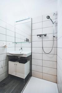 Koupelna v ubytování Apartmenthaus Maxl