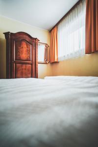 Postel nebo postele na pokoji v ubytování Apartmenthaus Maxl