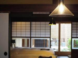 Lova arba lovos apgyvendinimo įstaigoje NIPPONIA HOTEL 伊賀上野 城下町