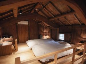 Lova arba lovos apgyvendinimo įstaigoje NIPPONIA HOTEL 伊賀上野 城下町