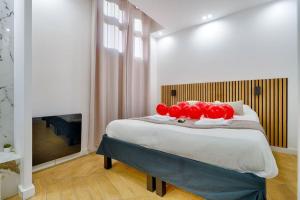 Ένα ή περισσότερα κρεβάτια σε δωμάτιο στο Welcome to Amor & Spa