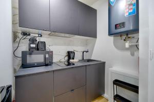 A kitchen or kitchenette at Welcome to Amor & Spa