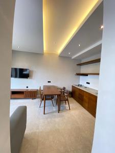 TV a/nebo společenská místnost v ubytování Cuan House Ubud + 33 fotografií