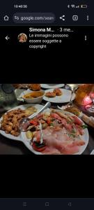 a picture of a plate of food on a table at Bed and Breakfast Almaran in Trapani