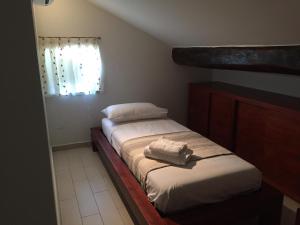 A bed or beds in a room at SunSea