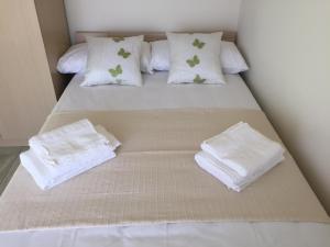 A bed or beds in a room at SunSea